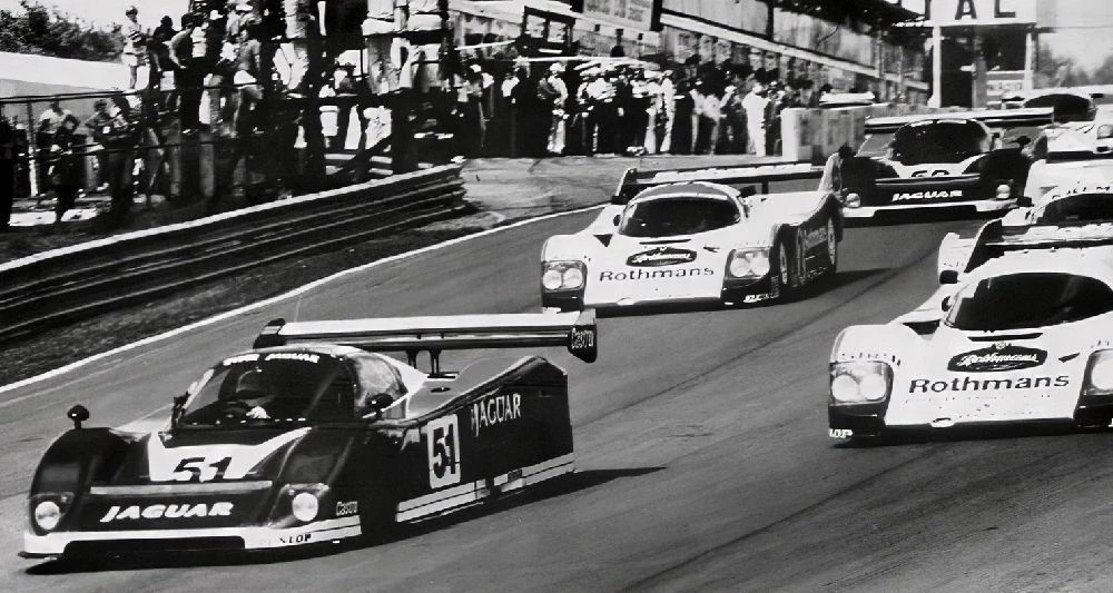 XJR-6 leading Rothmans Porsches at Mosport 1985