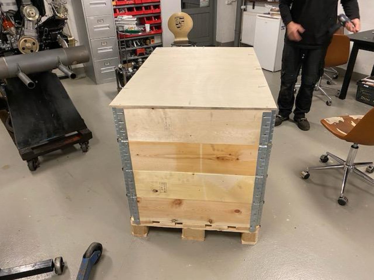 New pistons and barrels for the four-cam engine on a workshop bench