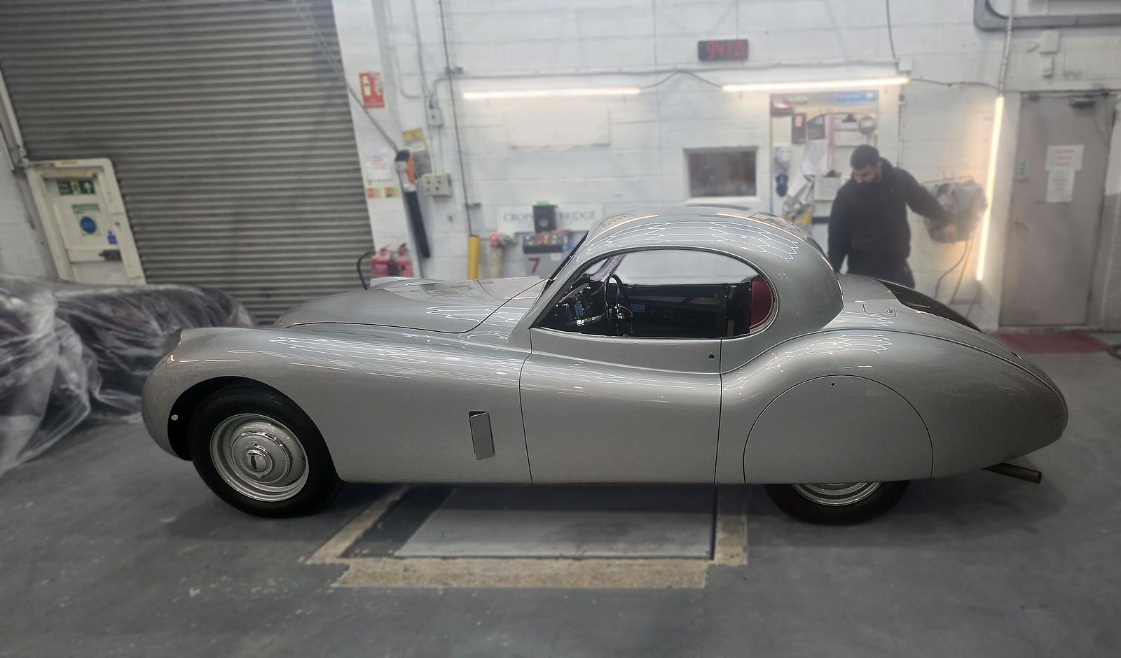 The prototype XK120 Coupé, chassis 679002, back in the workshop after paint
