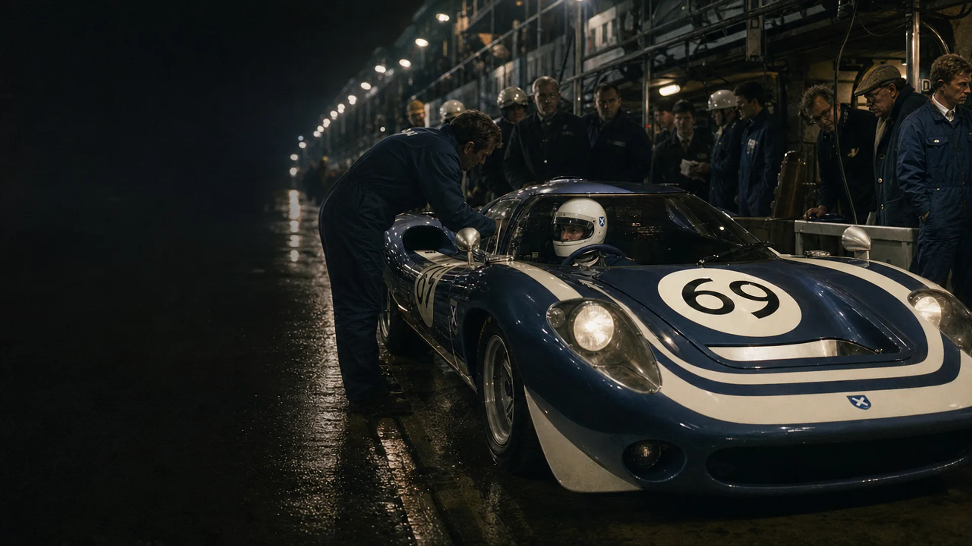 The LM69 in the pit lane at night