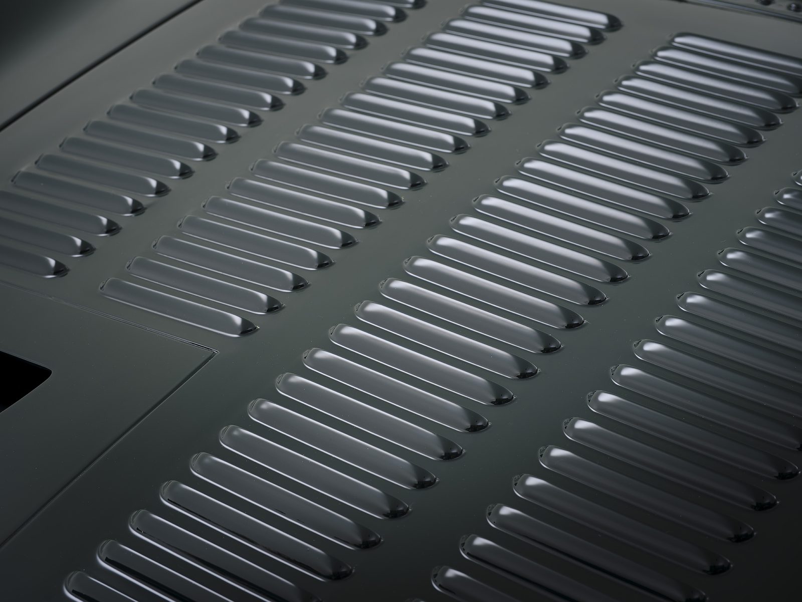XJ13 Toolroom Copy — hand-formed louvered panel